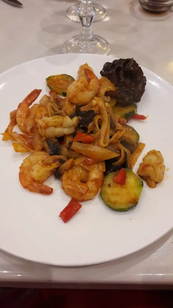 Wok de Calamars Et Crevettes Aux Légumes Sauce Saté